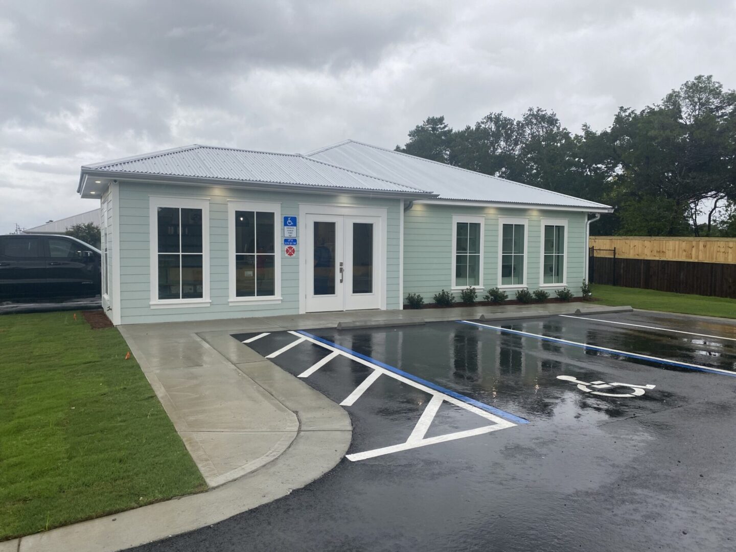 A building with a parking lot in front of it